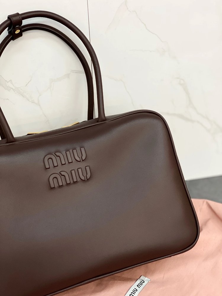 miumiu Original Leather Handheld Official Document Bag for Women 2025 New Large Capacity Retro Under