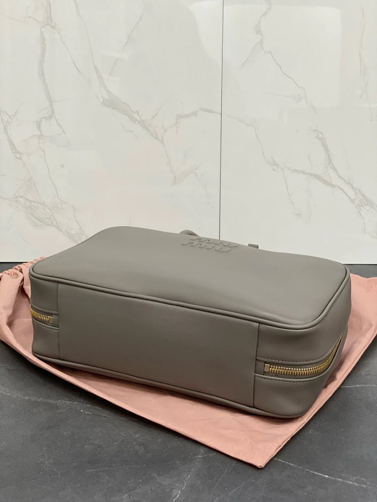 miumiu Original Leather Handheld Official Document Bag for Women 2025 New Large Capacity Retro Under